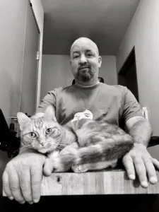 Andrew Grant and his cat
