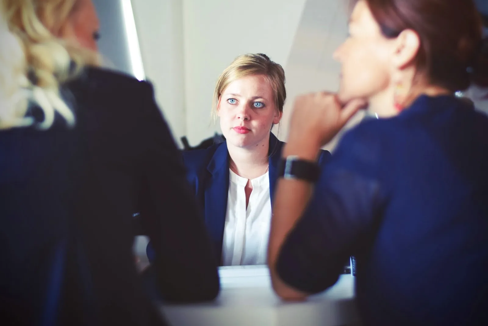 People seated together in an interview or meeting