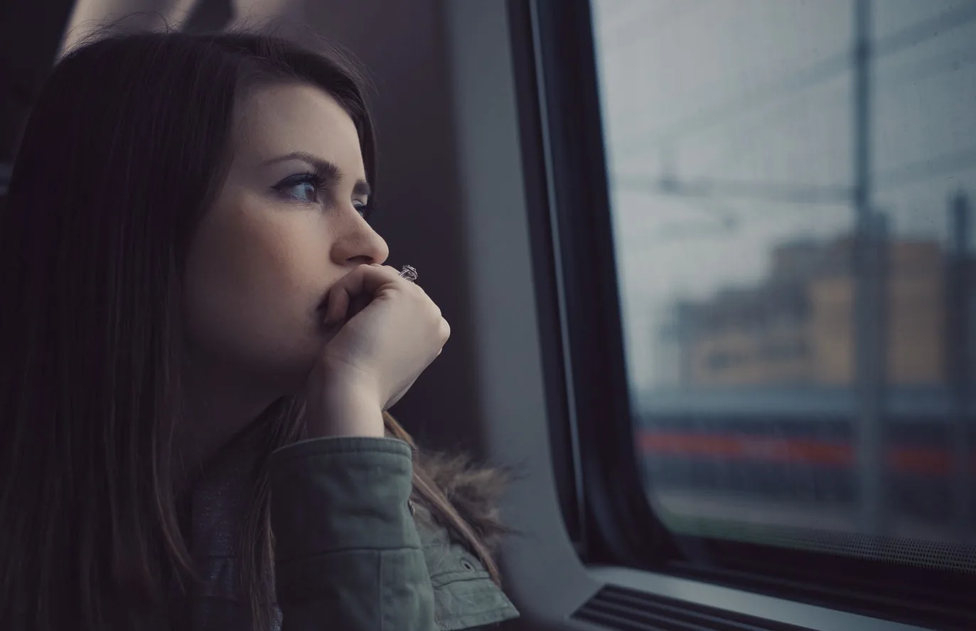 A person looking out of a window
