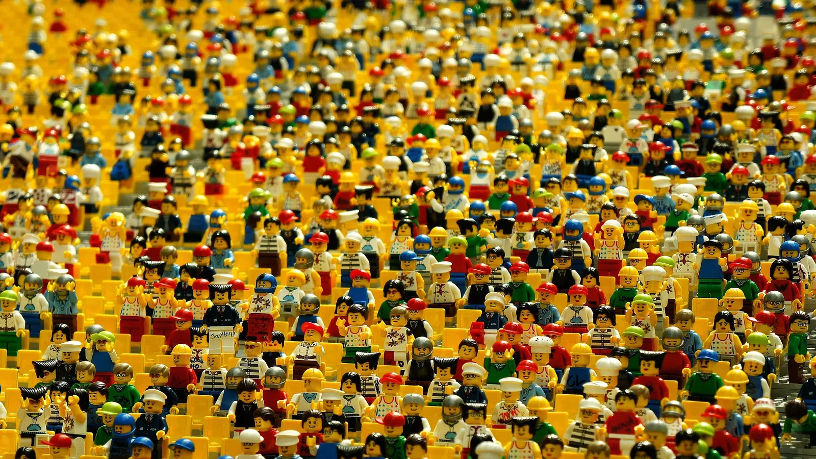 A large crowd of colourful toy figures