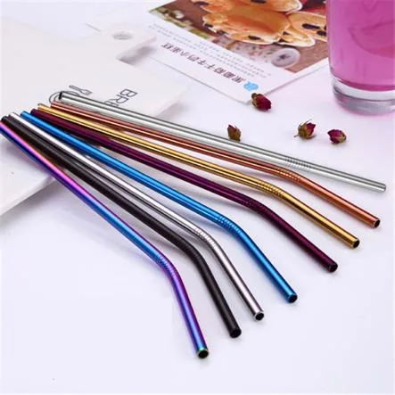 Metal straws placed onto a table.