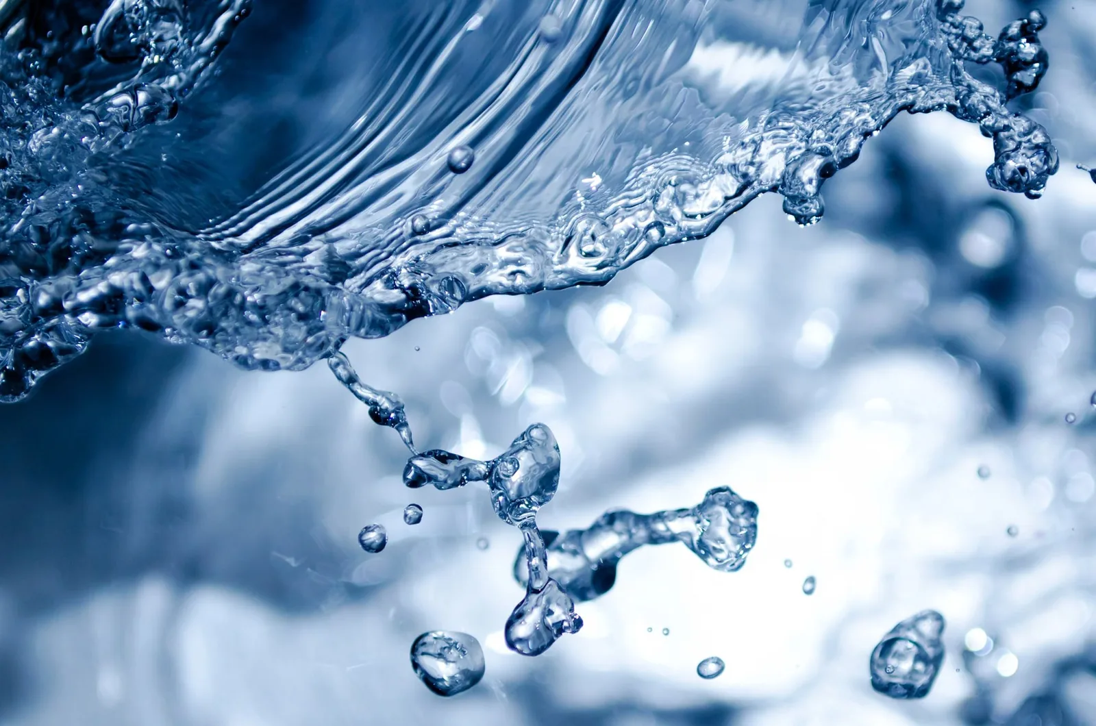 A close-up photograph of splashing water