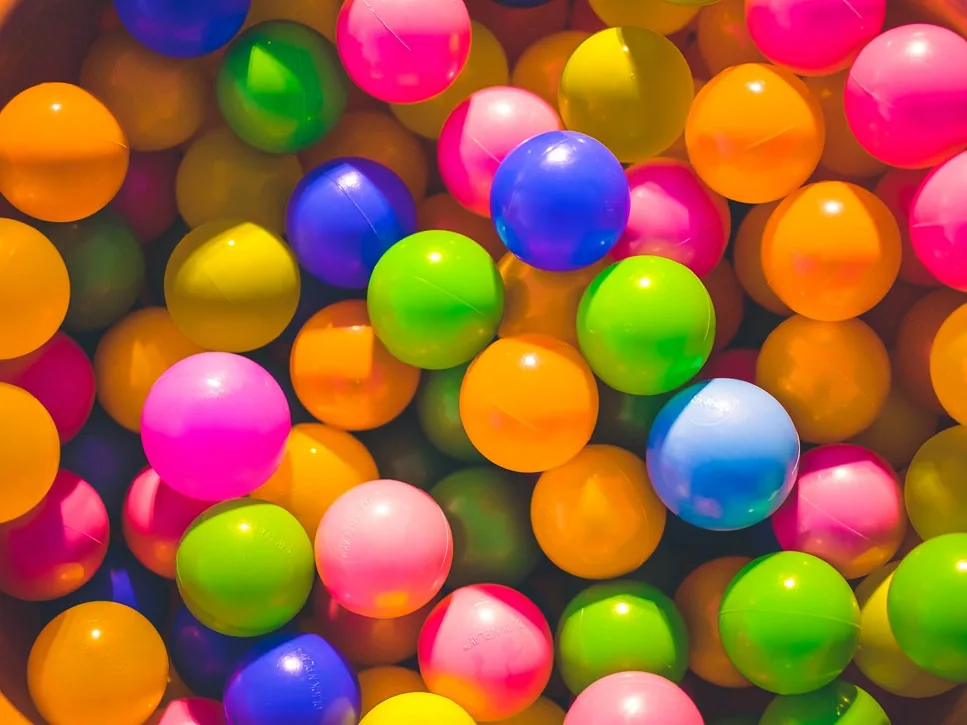 Brightly coloured balls in a play area