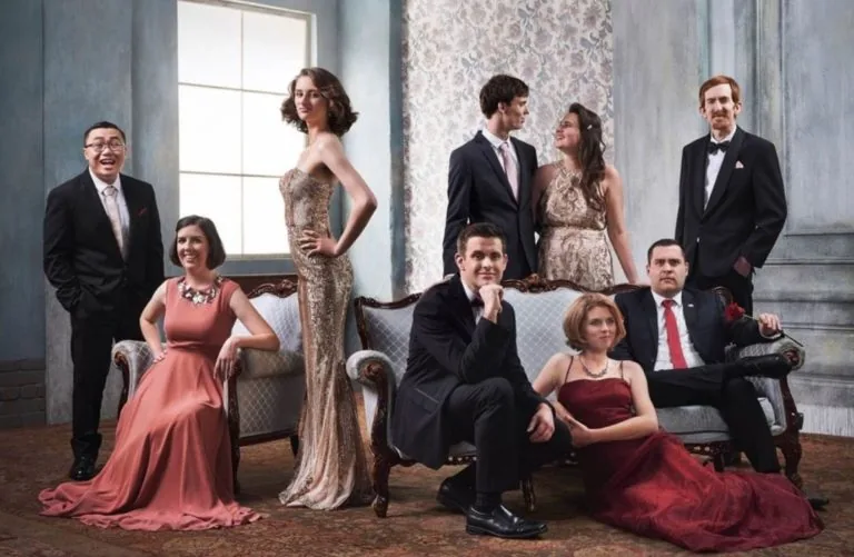 A group of people dressed in formal attire.