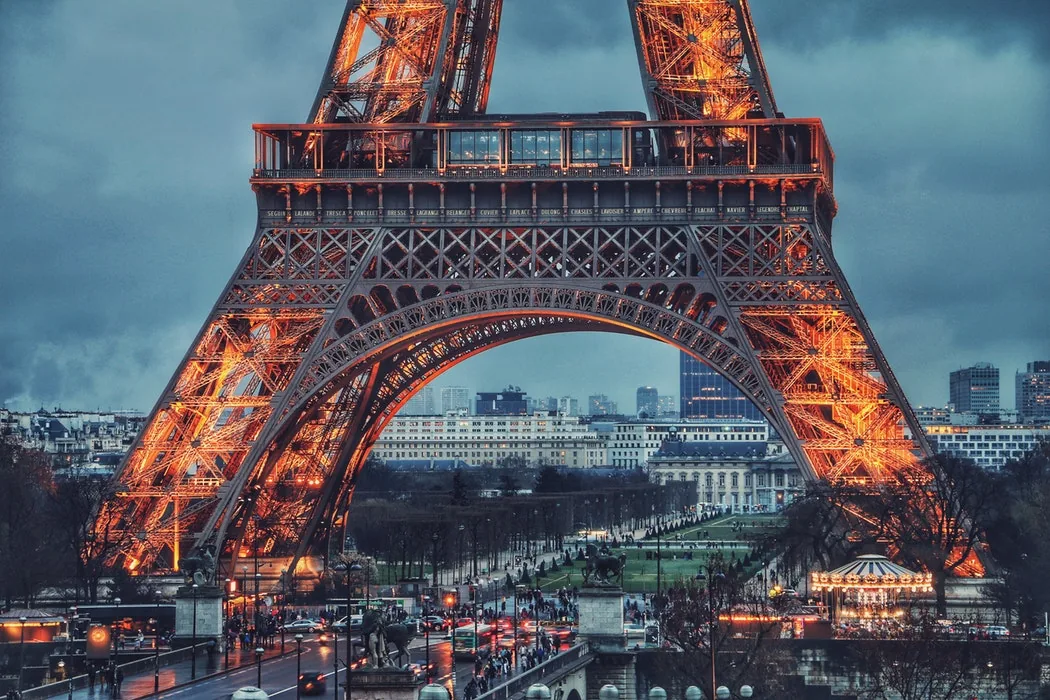 The illuminated Eiffel Tower above Paris