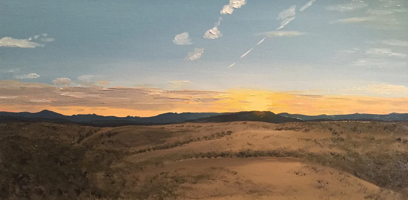 A Canberra-area landscape under a sunset sky