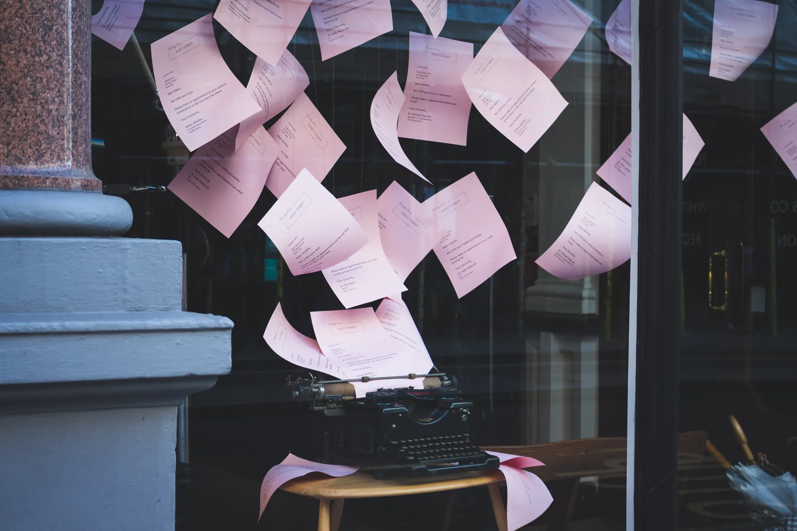 Sticky notes attached above a desk