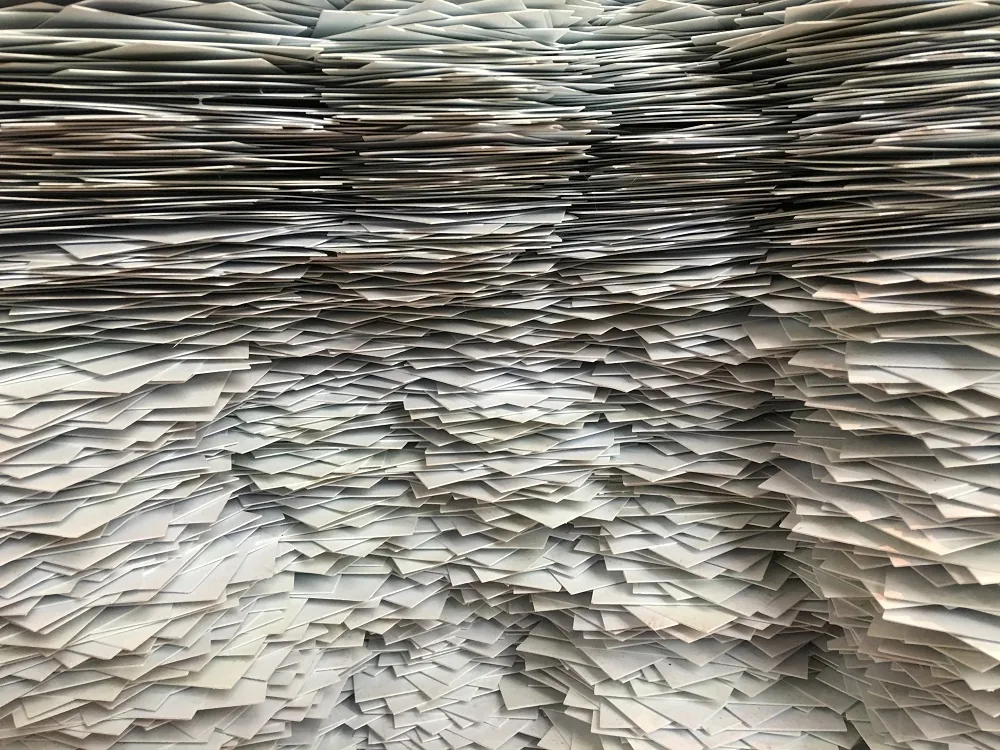 A close-up of stacked paperwork